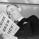 Napoleon Hill reading his own book, Think and Grow Rich, in 1937 (Library of Congress)